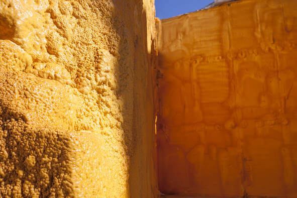 In Fairfield, Connecticut, yellow sprayed polyurethane foam is used to insulate house walls.